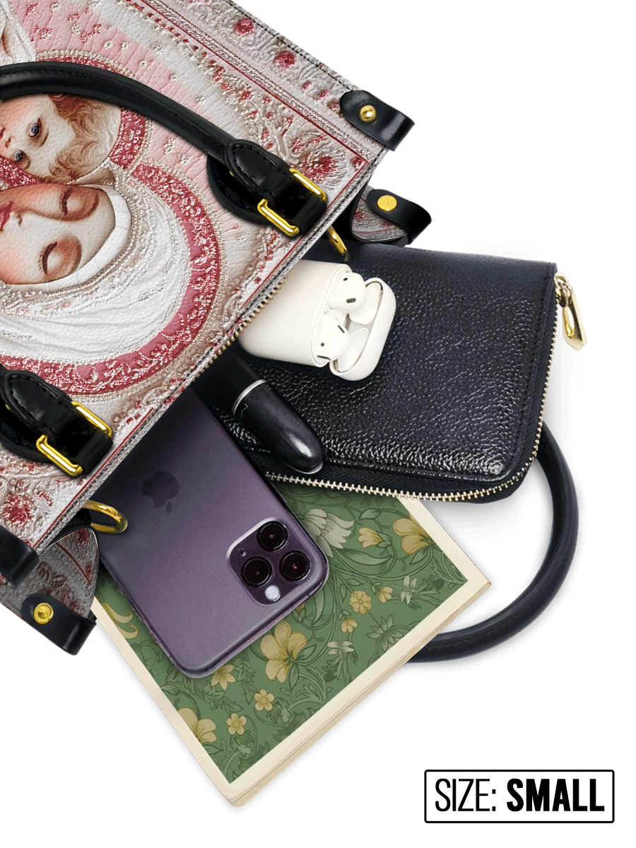 Divina Sacred Serenity: The Madonna’s Tender Embrace Leather Bag