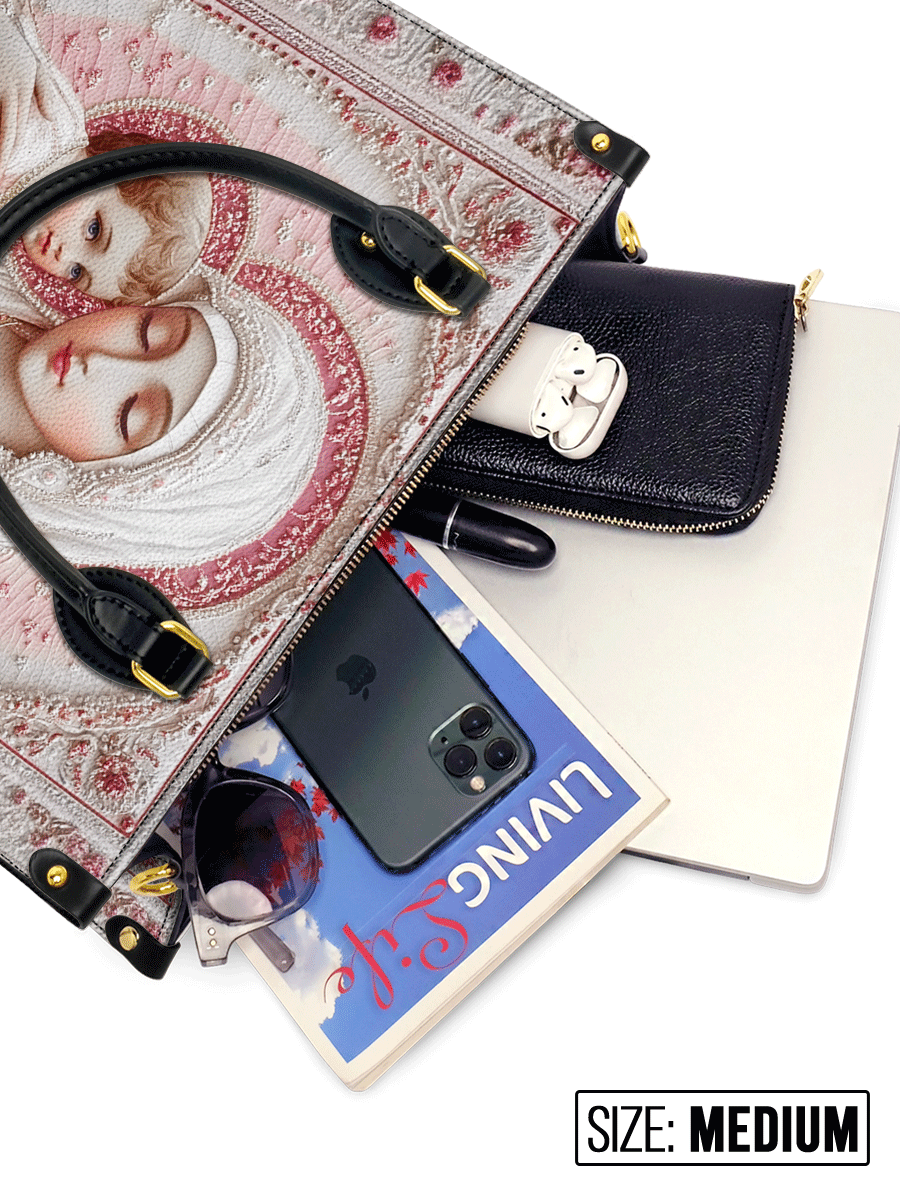 Divina Sacred Serenity: The Madonna’s Tender Embrace Leather Bag