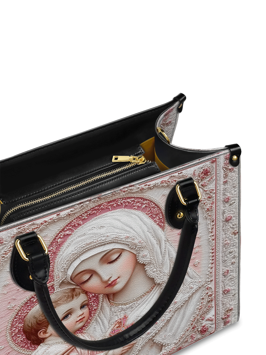 Divina Sacred Serenity: The Madonna’s Tender Embrace Leather Bag