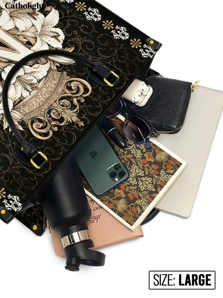 Divina  The Divine Monogram Leather Bag