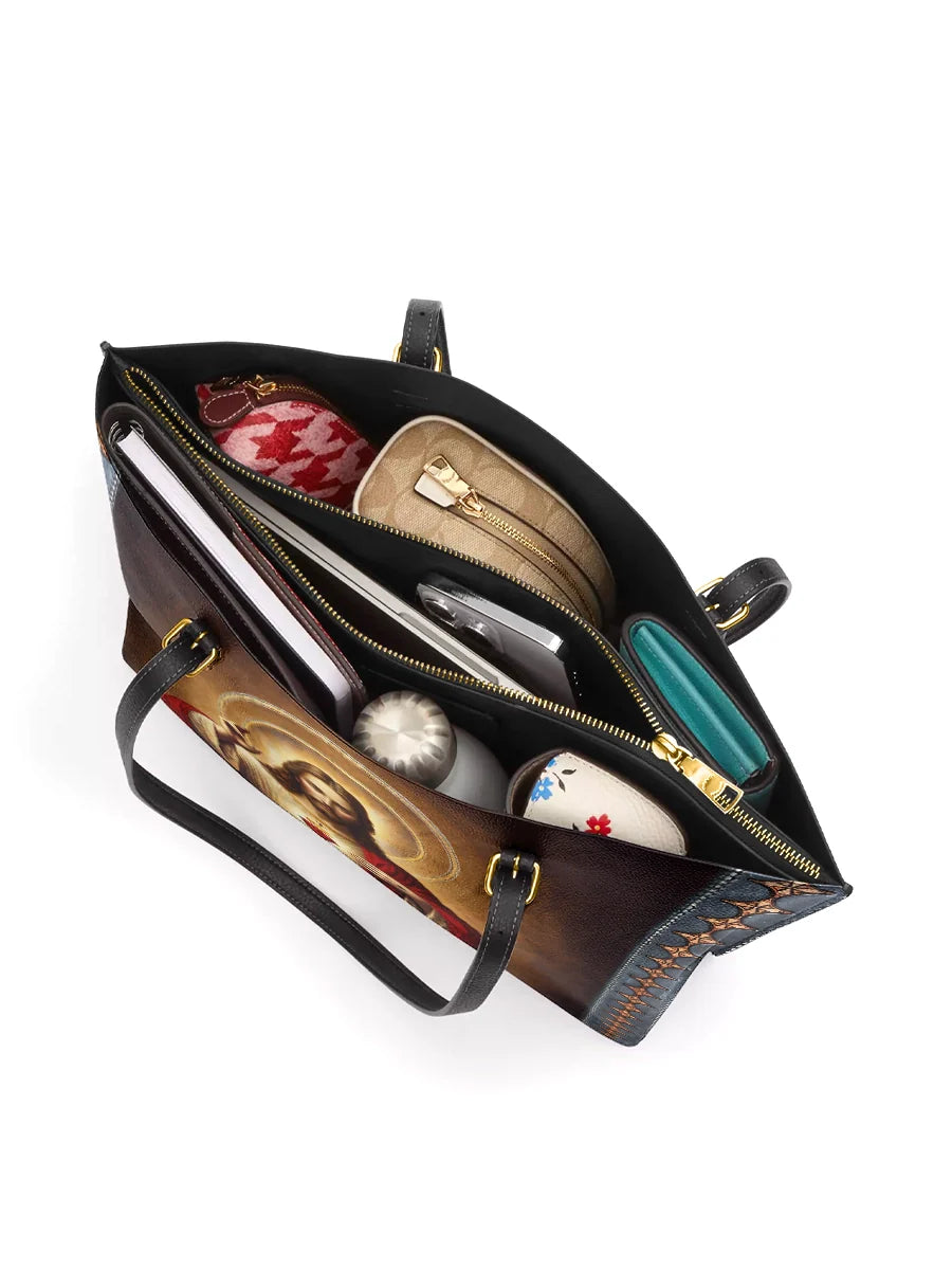 Divina A Testament of Grace and Compassion Leather Tote Bag